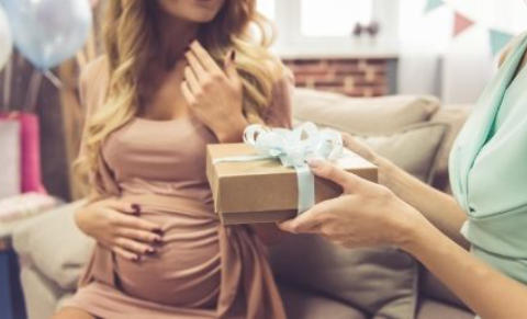 Women exchanging gifts at a baby shower